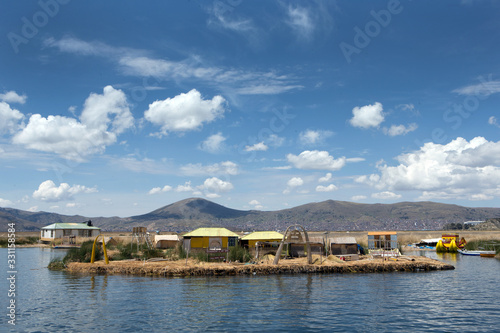 Puno Peru. Lake Titicaca. Floating village. Uros people. Reed culture. Reed houses.