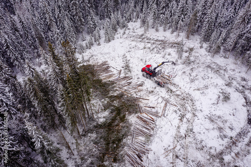 Sustaineable timber harvesting in Norway during wintertime, drone photo photo