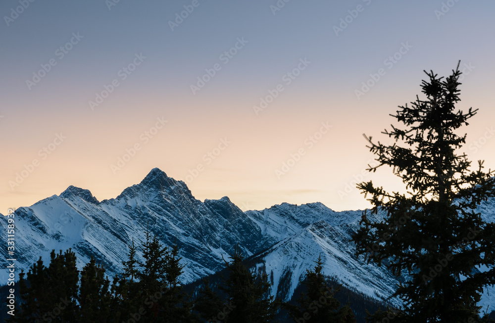 Stunning sunset view of Rocky Mountains around Banff Gondola in Banff National Park, Alberta, Canada.