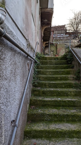 climb the stairs to old buildings