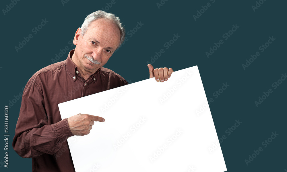 Senior man holds a blank board