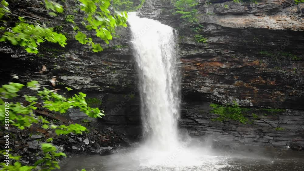 Aerial View of the Cedar Falls Trail At The Petit Jean State Park, Gorgeous, gigantic and majestic waterfall  Push out, wide shot, slow motion
