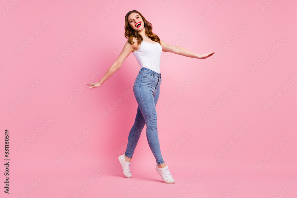 Full size photo of content redhead girl enjoy spring time weekend wear good look outfit footwear isolated over pastel color background Full size photo of content redhead girl enjoy spring time weekend wear good look outfit footwear isolated over pastel color background