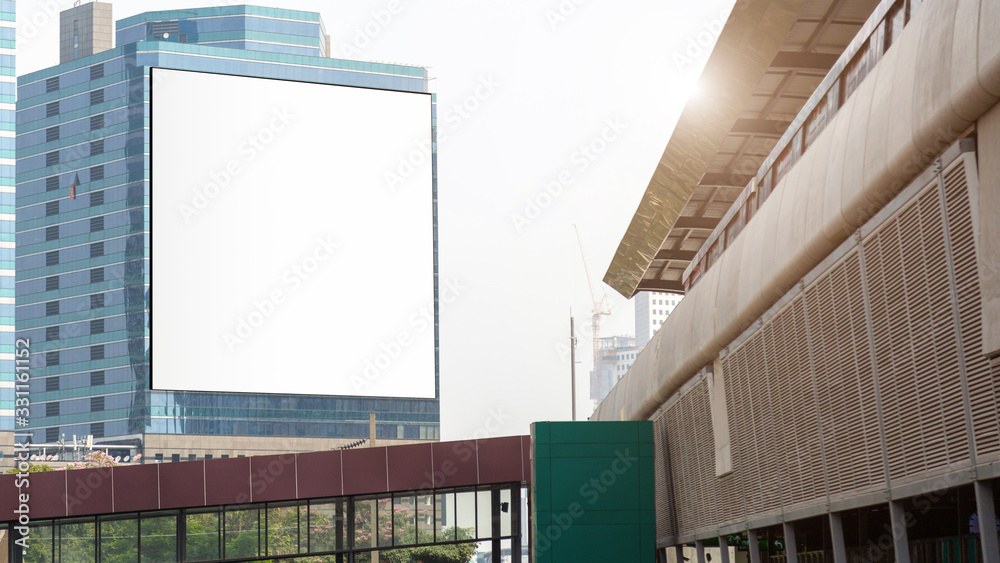 Large billboard on modern building wall, mock up Large billboard on modern building wall, mock up