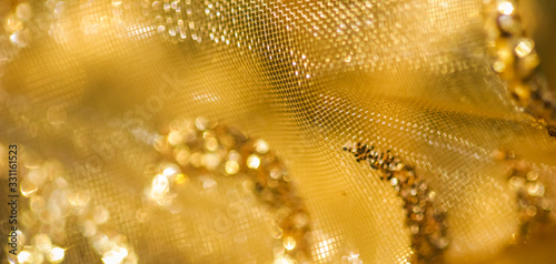 Golden abstract blur defocused background. Concept for New Years Eve, Christmas and happy holidays