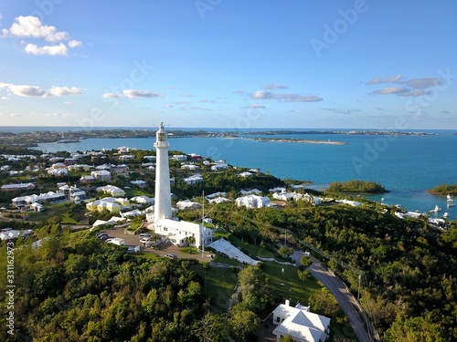 The drone aerial view of Bermuda islands and the Gibbs hill lighthouse. The Lighthouse is one of the first lighthouses in the world to be made of cast-iron.