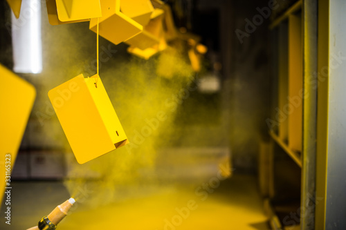 Spray paint colour onto product