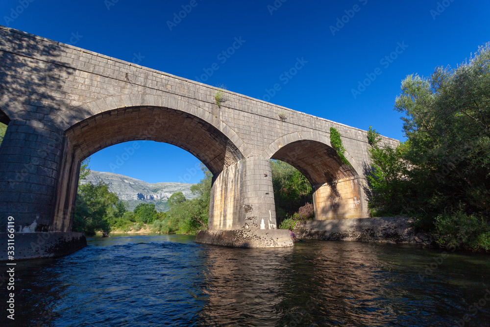 Stone bridge over the Cetina River