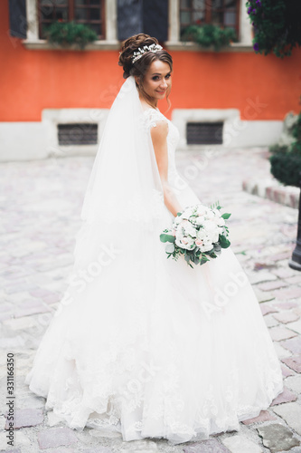 Portrait of a beautiful fashion bride, sweet and sensual. Wedding make up and hair