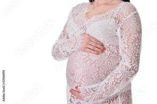 Beautiful pregnant woman posing isolated on white background