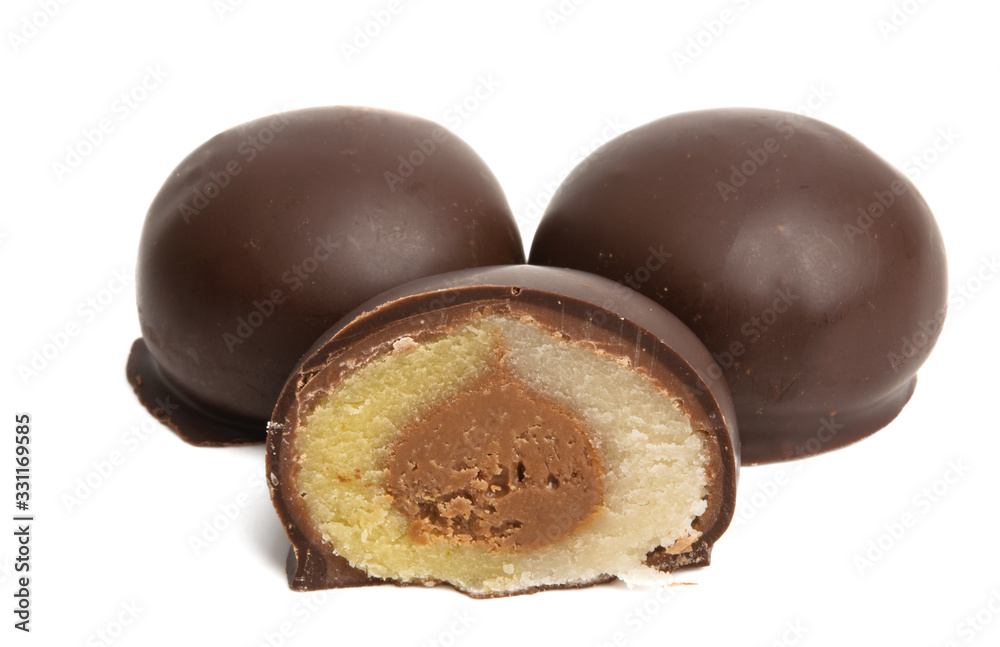 round chocolate candies with marzipan filling round chocolate candies with marzipan filling