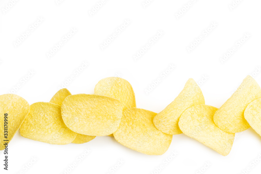 Patatas fritas sobre un fondo blanco liso y aislado. Vista superior y de cerca. Copy space Patatas fritas sobre un fondo blanco liso y aislado. Vista superior y de cerca. Copy space