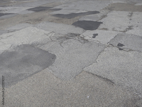 patchwork or hotchpotch of fifty shades of gray asphalt