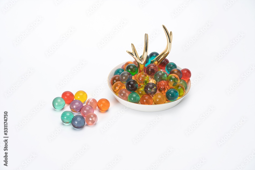 The colorful fragrant beads with all kinds of fragrance in the white background can make the air fresh and let the opposite sex like you, so that you can put it in the car or the room