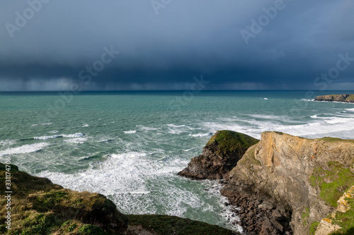 Large rain cloud over the sea in Cornwall Cloudscape