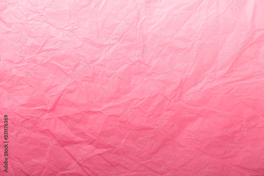 Texture of crumpled dark red wrapping paper with white gradient, closeup. Light pink old background. Texture of crumpled dark red wrapping paper with white gradient, closeup. Light pink old background.