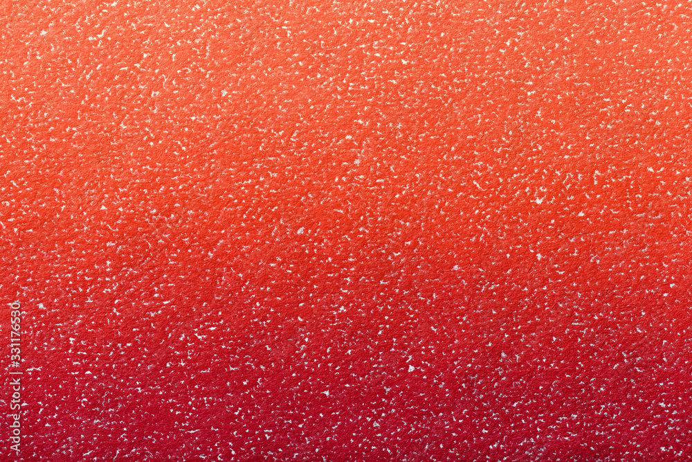 Fototapeta premium Texture of old dark red paper background with coral gradient, closeup. Structure carmine craft cardboard.