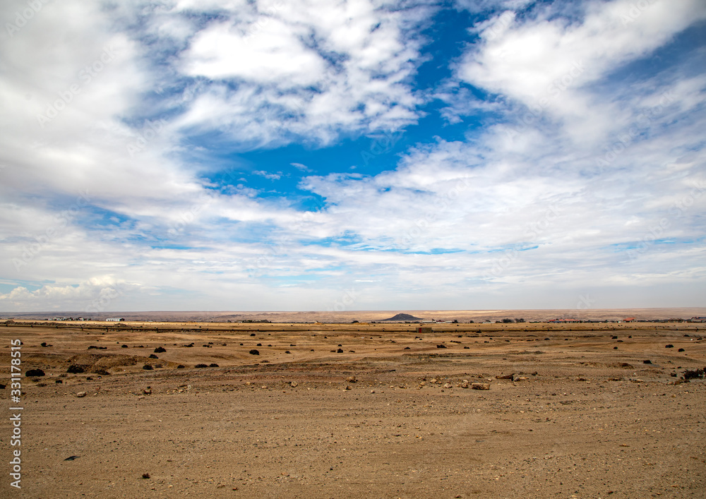 Landscape of the Namib desert near the city of Swakopmund at the Atlantic ocean in Namibia Landscape of the Namib desert near the city of Swakopmund at the Atlantic ocean in Namibia