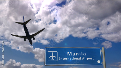 Plane landing in Manila with signboard
