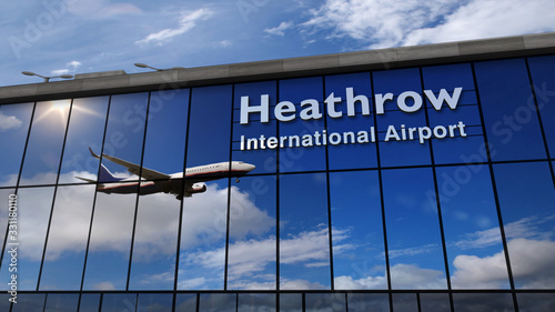Airplane landing at London Heathrow mirrored in terminal