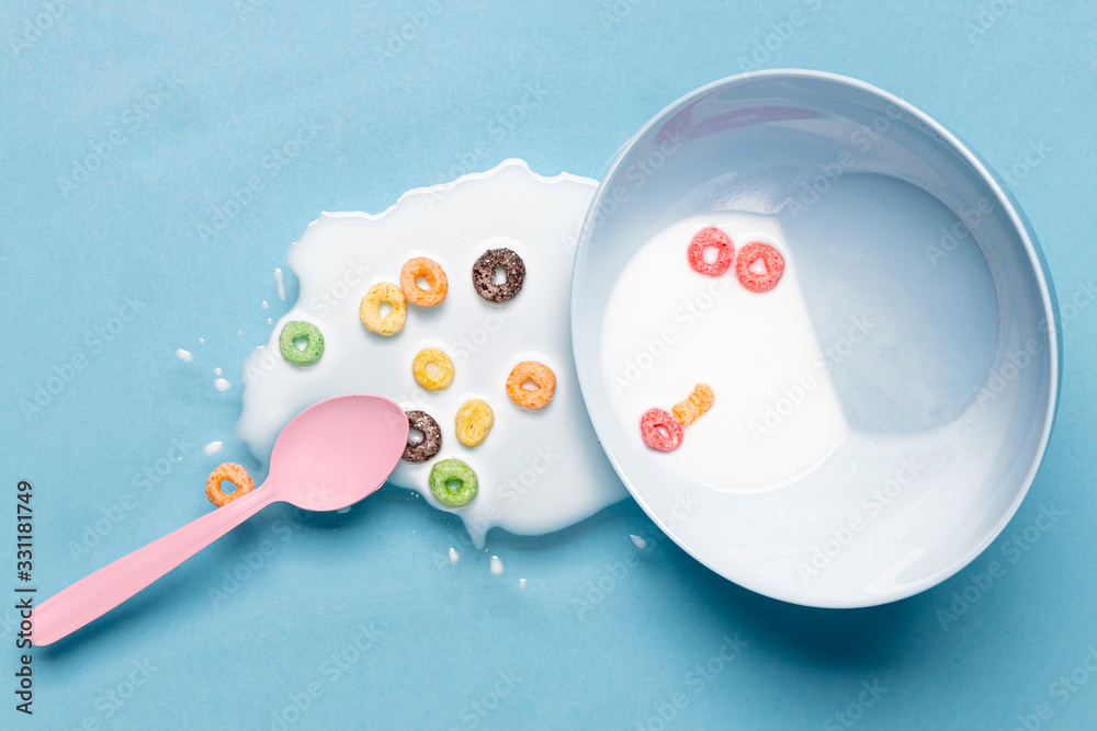Spilled milk and milk in the bowl top view Spilled milk and milk in the bowl top view