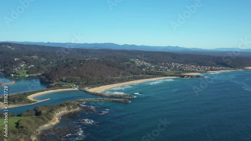 Aerial drone view of Wagonga Head and Wagonga Inlet at Narooma on the New South Wales South Coast, Australia, on a sunny day   photo