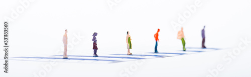 Equality concept with people figures on blue charts isolated on white  panoramic shot
