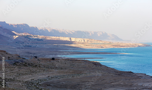 Panoramic view of the Dead Sea, whose level falls by one meter per year against the background of the Judean mountains. Israel, Middle East