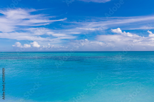 Caribbean panorama Hawaiian Maldivian coast with a boat in a turquoise tropical sea