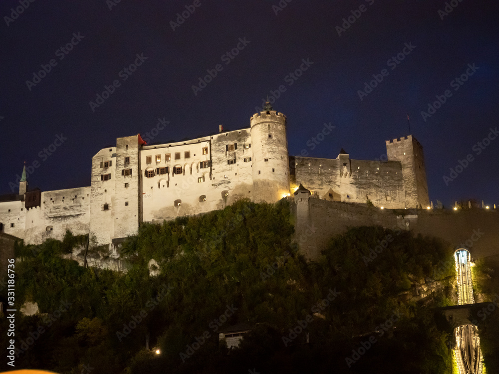 Salzburg, Austria - Oct 10th, 2019: Hohensalzburg Fortress sits atop the Festungsberg, a small hill in the Austrian city of Salzburg.
