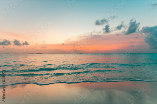 Fototapeta Naklejka Na Ścianę i Meble -  Colorful ocean beach sunrise or sunset. Peaceful tropical nature scenery, summer landscape, exotic mood. Bay with shore and calm waves