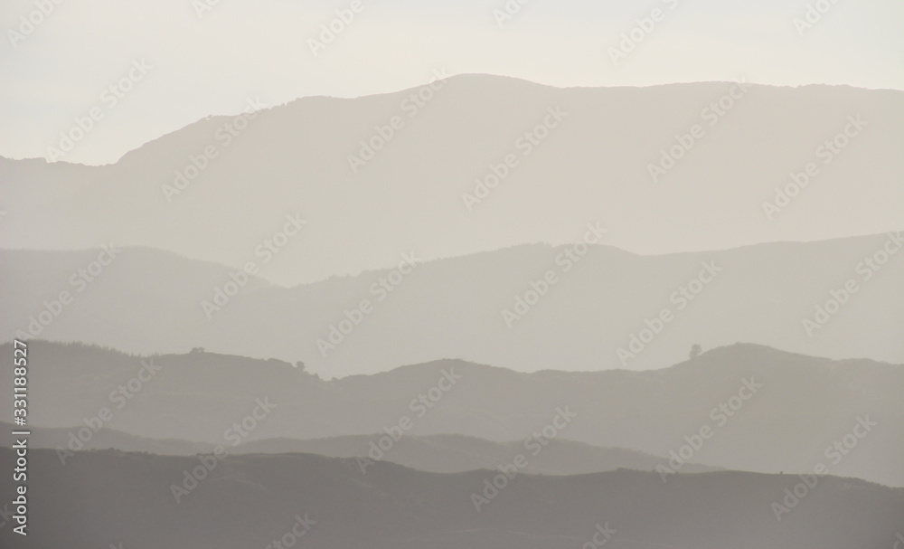 Lines of foggy layered hilly landscape in Wellington, New