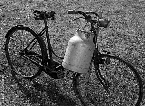 old bicycle of a milkman with black and white effect