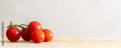 tomatoes on wooden board