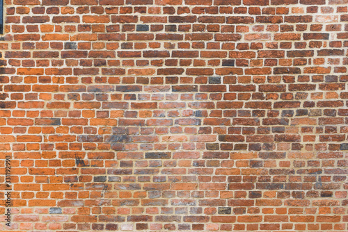brick wall texture with wood grain as background