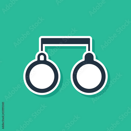 Blue Handcuffs icon isolated on green background. Vector Illustration