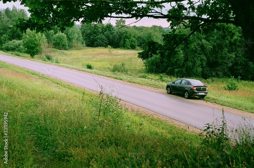 Film photography of the car on the road