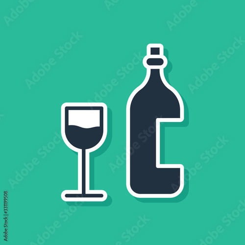 Blue Wine bottle with wine glass icon isolated on green background. Happy Easter. Vector Illustration