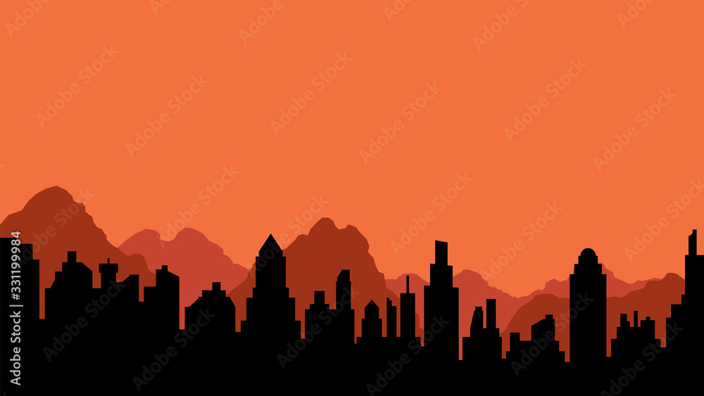 Silhouette of city and mountains
