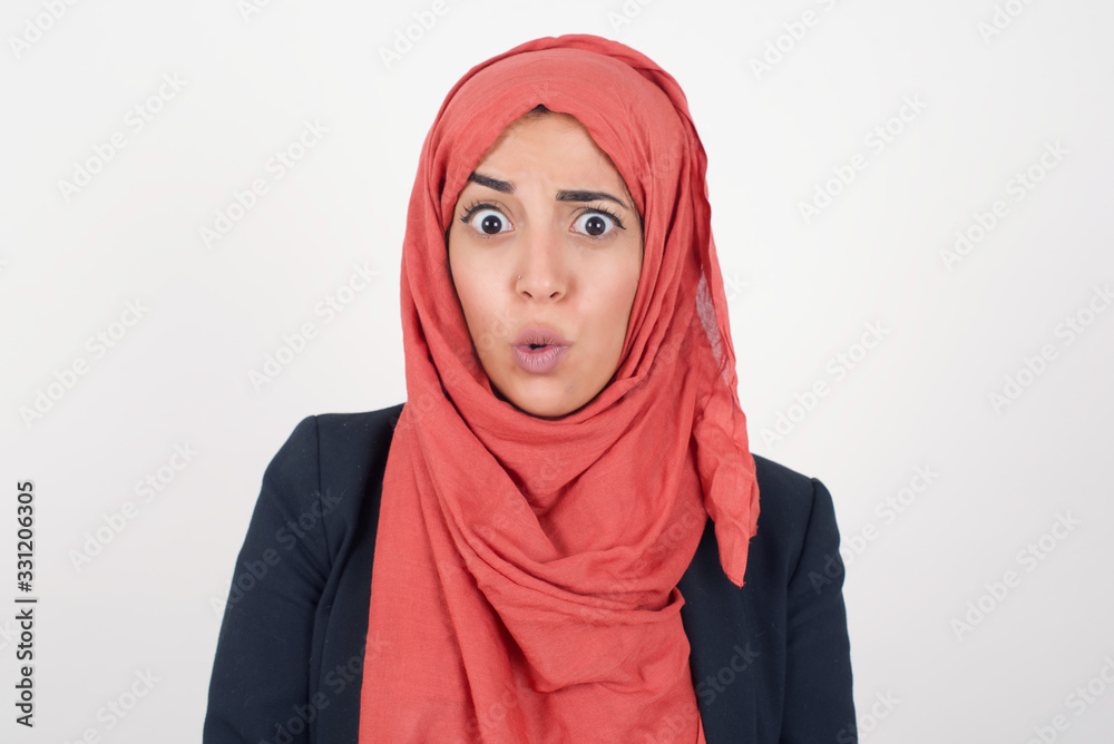 Brunette woman in casual clothes expressing disgust, unwillingness, dislike, disregard having tensive look frowning face. Cauasian woman with pleasant appearance looking indignant digusting something Brunette woman in casual clothes expressing disgust, unwillingness, dislike, disregard having tensive look frowning face. Cauasian woman with pleasant appearance looking indignant digusting something