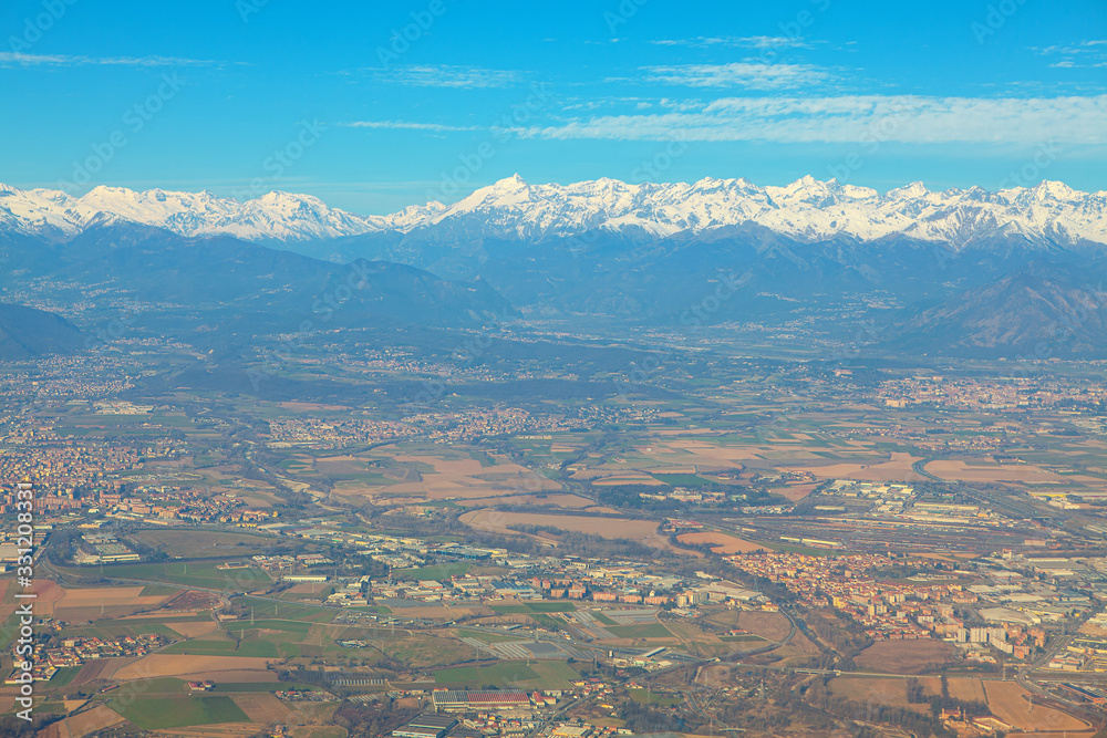 Turin suburb scenery with Alps mountains