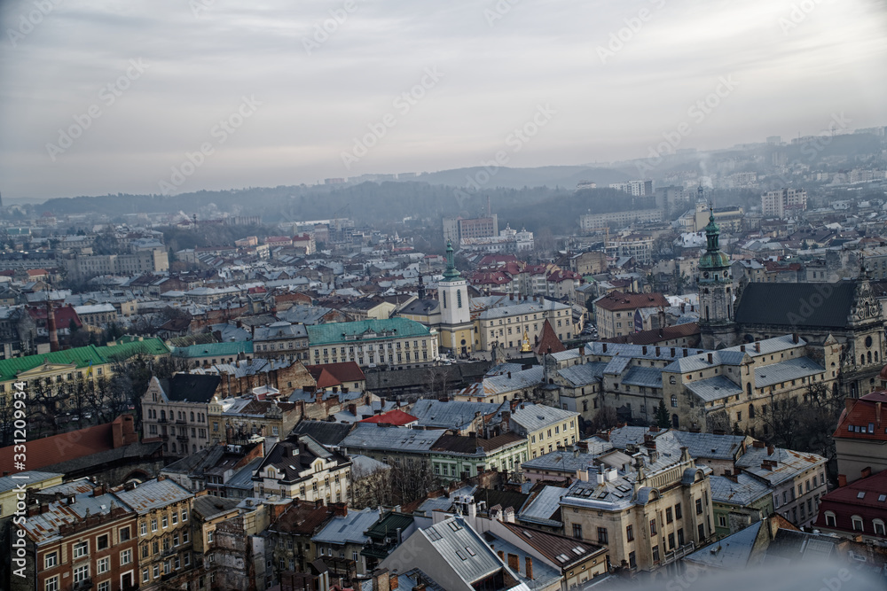 Obraz premium Lviv panorama. Aerial view on the old centre of Lviv in Western Ukraine, with on the left the Uspensky church and on the right the Dominican church and the Town Hall