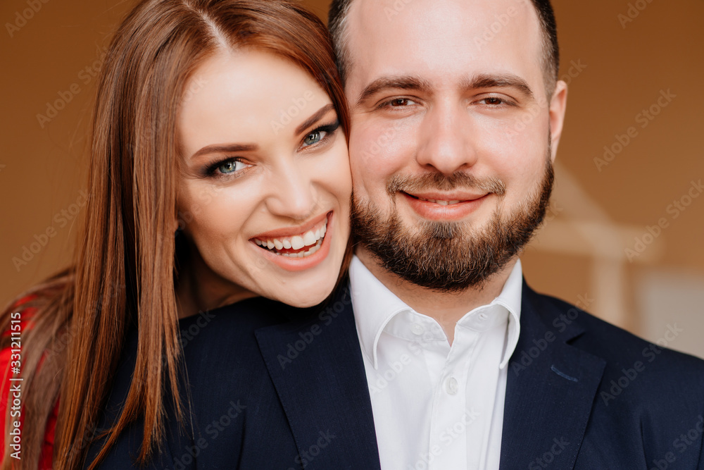 close-up beautiful lovers man and woman smile close-up beautiful lovers man and woman smile