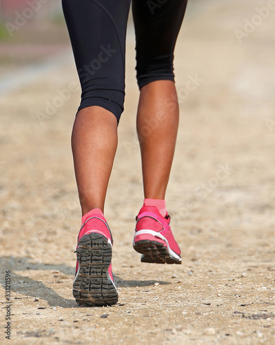 legs of a african girl during race © ChiccoDodiFC