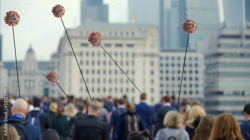Crowd of people walking in slow motion with Coronavirus graphic animating above and pointing to individuals. In this version graphics are natural defocused. photo
