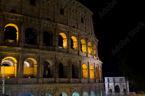 Colosseum night view, Rome landmark, Italy