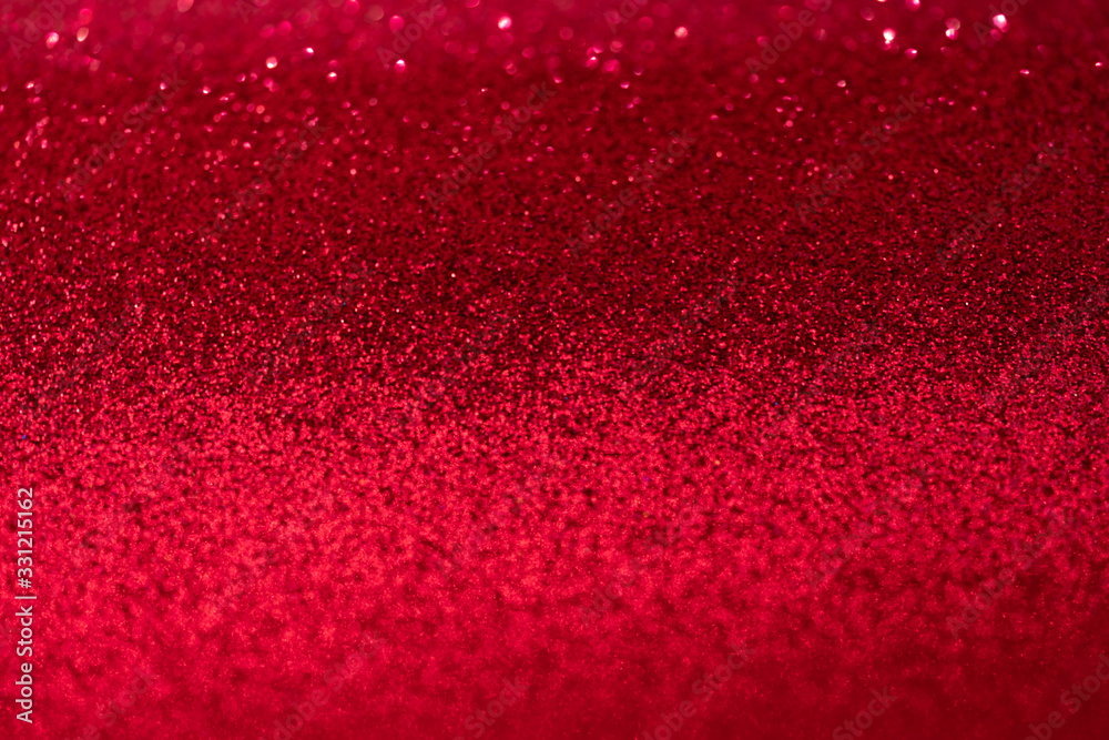 Glitter, sparkle defocused blurred red background