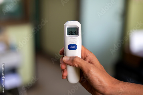 Body Temperature Measurement in hand.