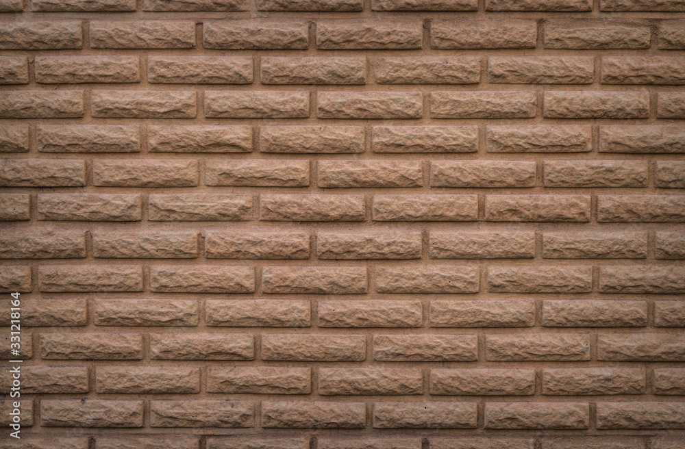 Geometric pattern on the wall in the shape of an old brick Geometric pattern on the wall in the shape of an old brick