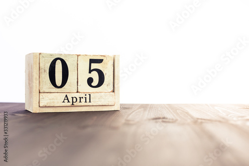 April 5th, fourth month of the clendar - copy space for text next to April symbol photo